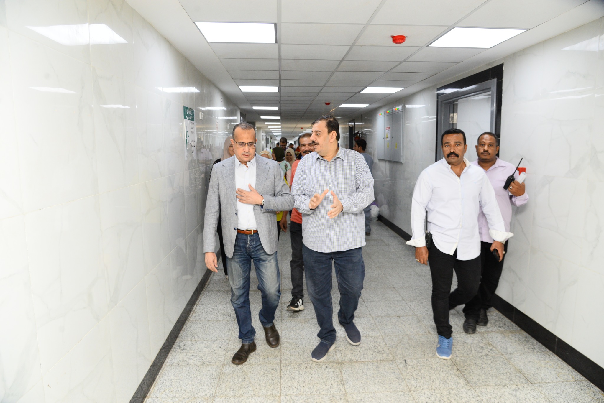 Professor Dr. Alaa Attia, Dean of the Faculty of Medicine and Chairman of the Board of Directors of University Hospitals, conducts an inspection tour of the general reception at the main hospital to ensure the smooth running of operations.