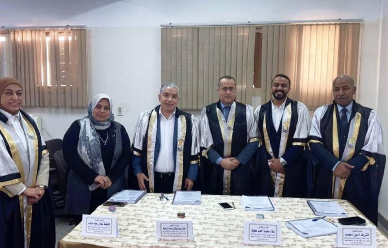 The Dean of the Faculty of Medicine at Assiut University chairs a committee discussing a scientific thesis on modern techniques for relieving pain in hip joint surgeries.