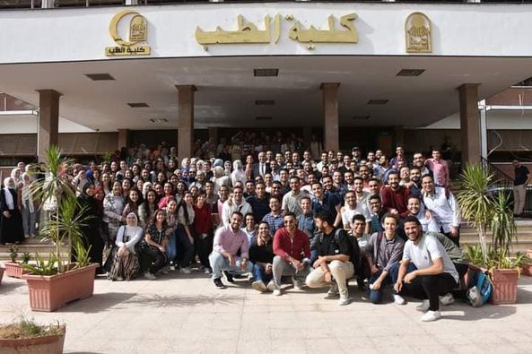 Memorial photos of Professor Dr. Amani Omar, Vice Dean of the College for Postgraduate Studies and Research, and Professor Dr. Muhammad Abdel Rahman, Vice Dean of the College for Education and Student Affairs.