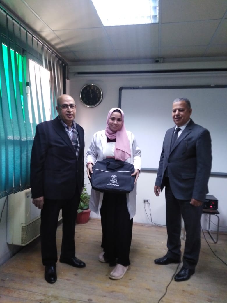 Honoring a group of resident doctors at Assiut University Pediatric Hospital