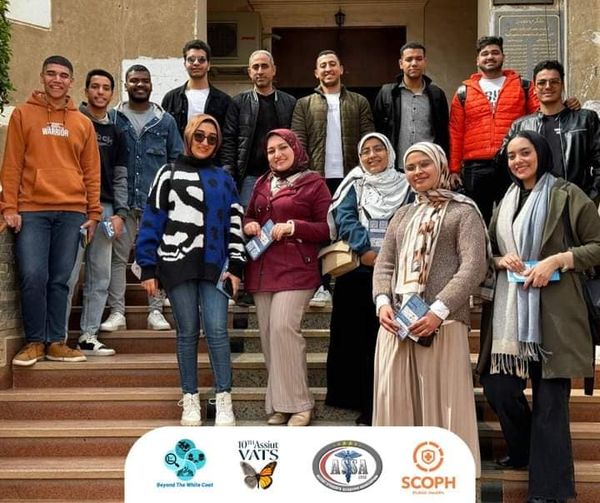 A team of young doctors on a field visit to Al Salam School to raise awareness of lung cancer and the dangers of smoking.