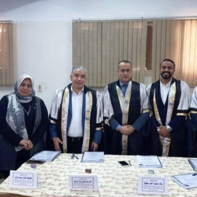 The Dean of the Faculty of Medicine at Assiut University chairs a committee discussing a scientific thesis on modern techniques for relieving pain in hip joint surgeries.
