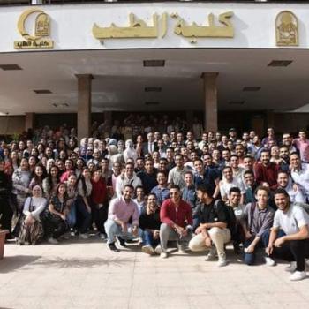 Memorial photos of Professor Dr. Amani Omar, Vice Dean of the College for Postgraduate Studies and Research, and Professor Dr. Muhammad Abdel Rahman, Vice Dean of the College for Education and Student Affairs.