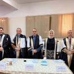 The Dean of the Faculty of Medicine at Assiut University participates in a discussion of a scientific thesis on modern anesthesia techniques for hip fracture surgeries.